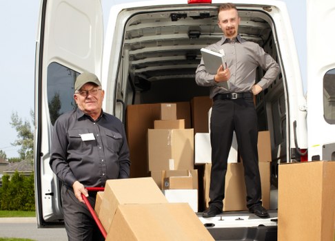 Barnet Removals team sorting reusable household items for recycling and donation