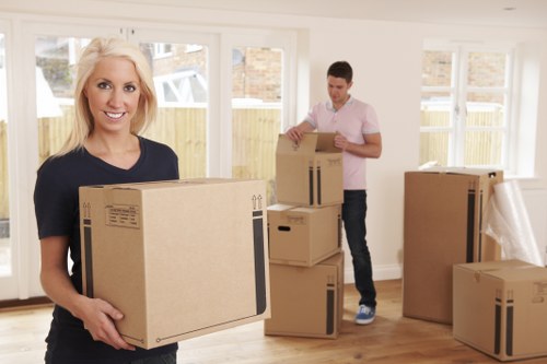 Furniture pick-up service removing a sofa in Barnet