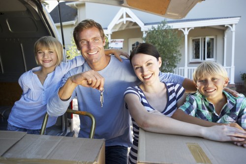 Professional removals crew organizing boxes and furniture during a Barnet relocation